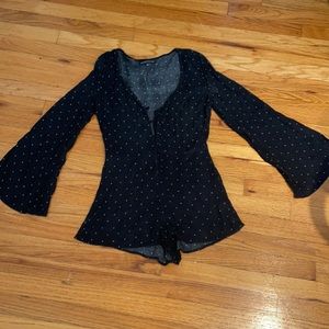 Very cute black button down romper